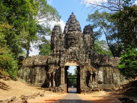 The main gate to Ankgor Thom - the last and most enduring capital city of the Khmer empire. Each gate is crowned with 4 giant faces and framed by elephants wading amongst lotus flowers.