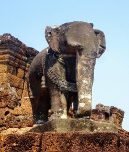 East Baray temple guarded by elephants on each corner. They are all made out of single slab of stone.