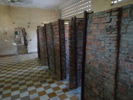 Another classroom turned into set of tiny holding cells. They broke through the wall to patrol the area and see if somebody was misbehaving. Prisoners were fed one bowl of porridge a day and were given a metal container (previously used to hold bullets) to relieve themselves.